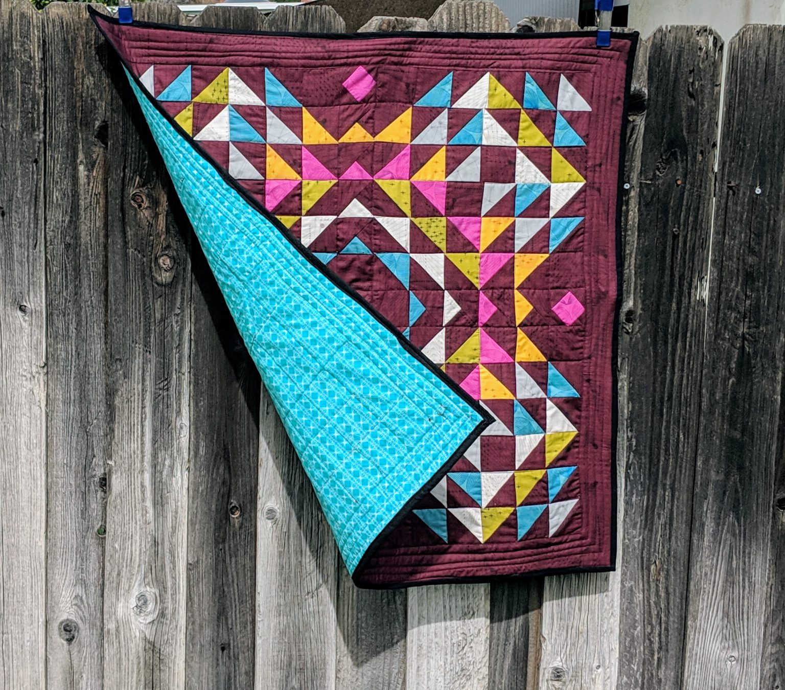 Totality Quilt Pattern featuring Quantum by Giucy_Giuce . I adore how these half square triangles are laid out #quilts #patchworkquilts #modernquilts